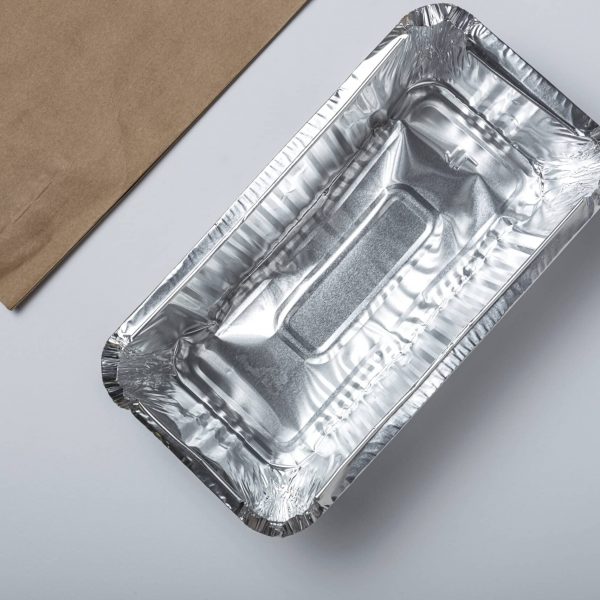 Empty aluminum take away food containers. Recycling concept